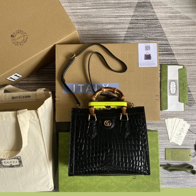 G*u*i top handle bags